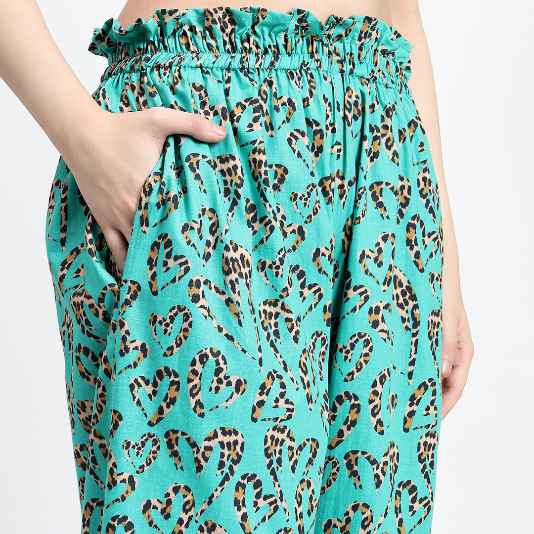 Wide-leg palazzo pants with flowing design, perfect complement to the top