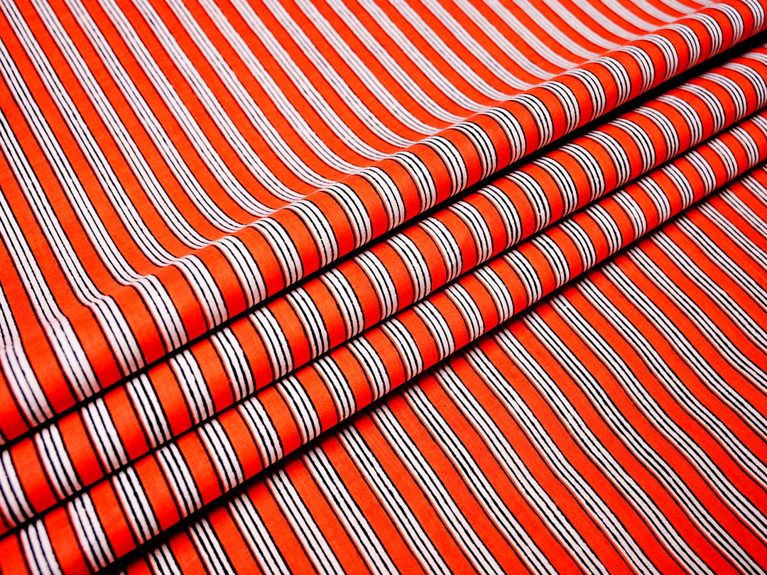 Retro stripes Christmas fabric by the yard with festive red, green, and white stripes.