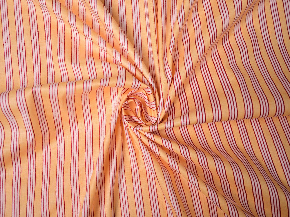 Soft yellow stripe cotton fabric, perfect for lightweight blouses and casual apparel