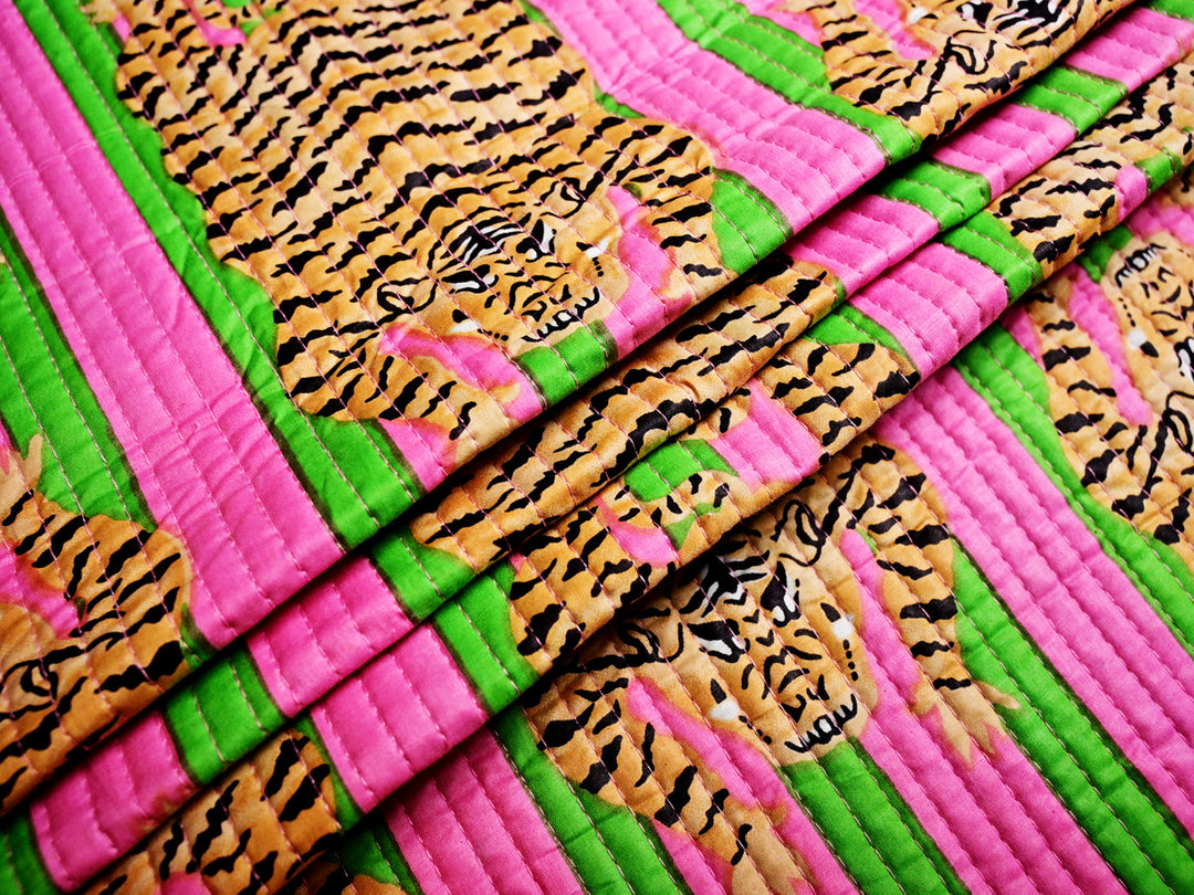 Boho-style hand-printed quilted fabric with tiger stripes, perfect for sustainable fashion bags and accessories.