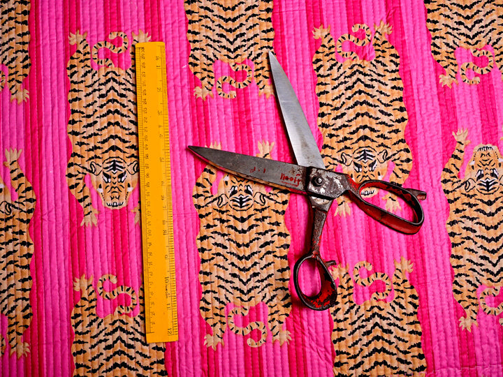 Striped tiger print quilted fabric, durable and soft, great for crafting handbags, cosmetic pouches, and DIY projects.