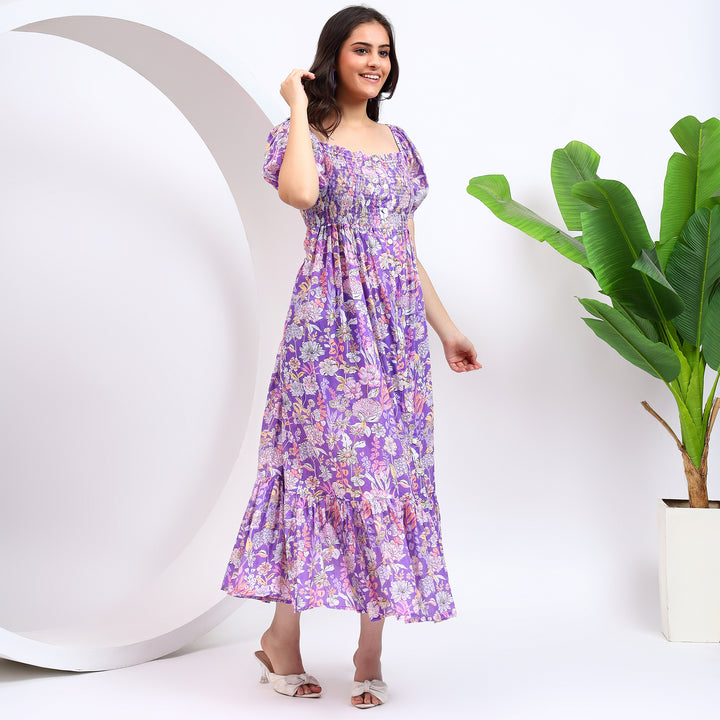 Purple puff sleeve midi dress with fit and flare silhouette