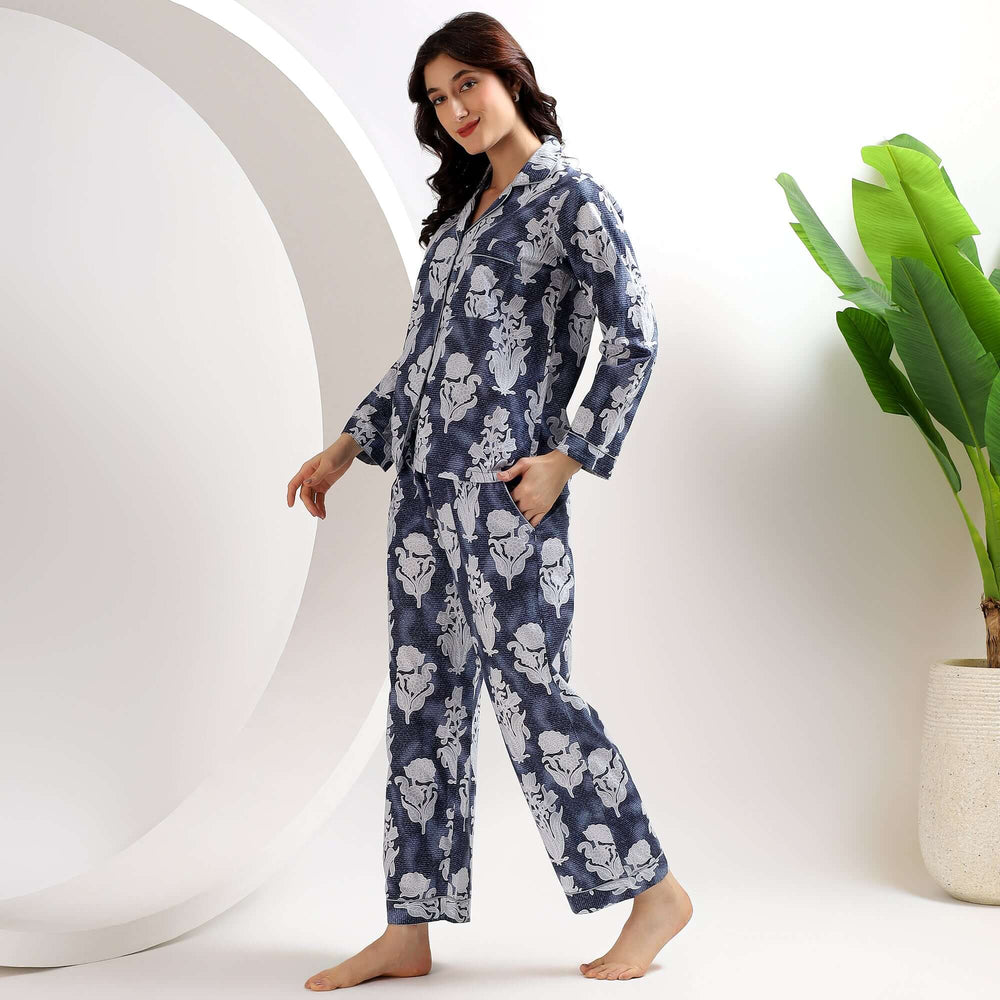 blue indigo matching pajamas for Women model showcasing comfort and style in a cozy setting.