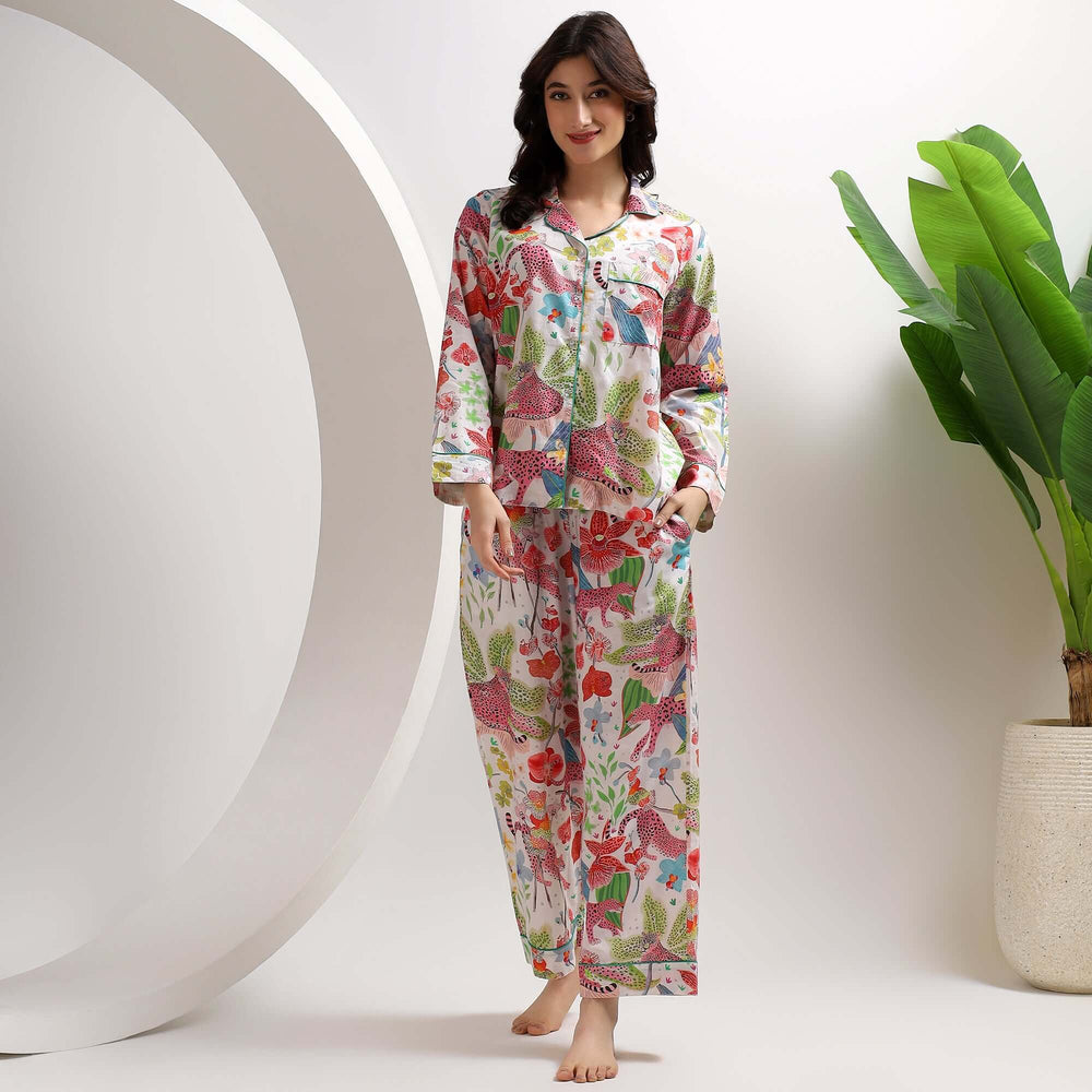 Stylish woman in colorful leopard print pajamas for women, showcasing comfort and relaxed fit.