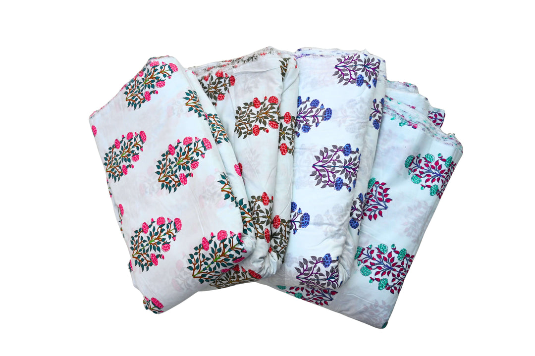 hand block print fabric - Set of folded fabric swatches with floral patterns on a white background