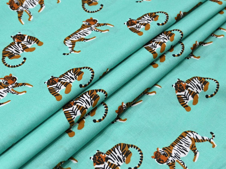 aqua color bold animal print cotton textile - wildlife tiger fabric design online fabrics store india