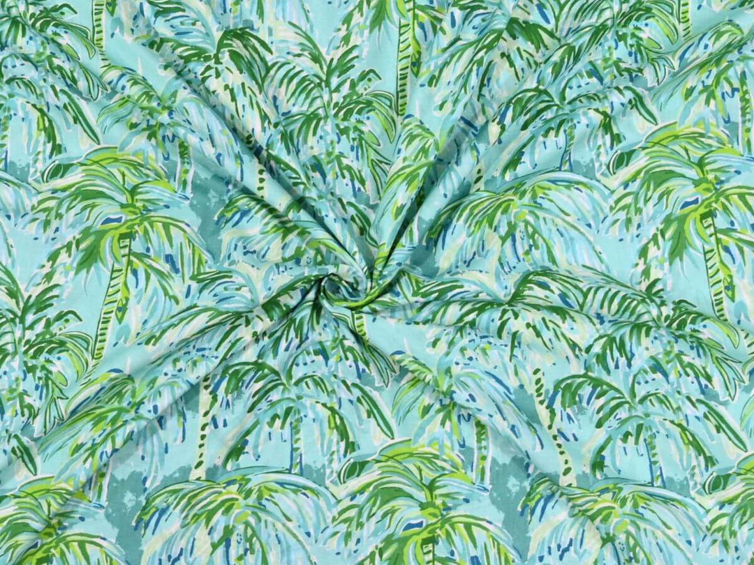 tropical cotton fabric for beachwear - palm tree print cotton textile close up
