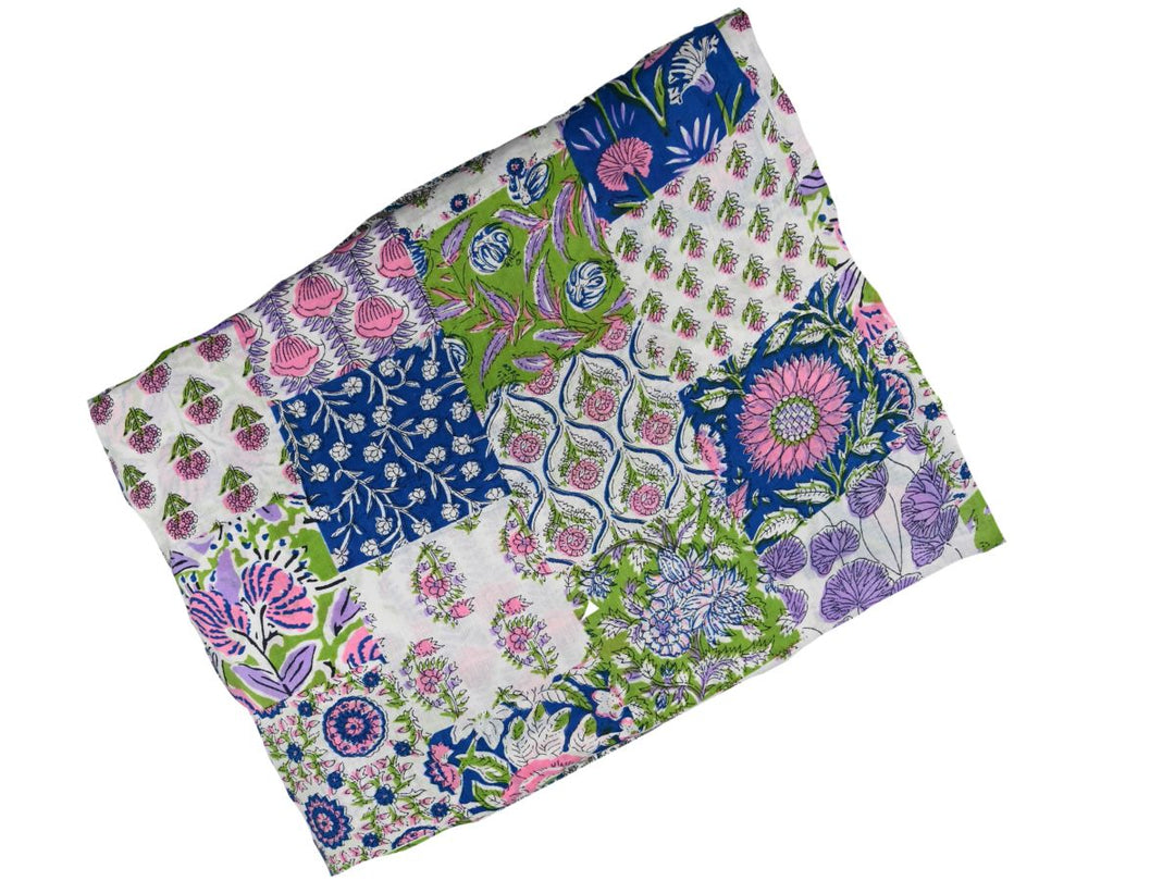 Patchwork sampler block print fabric with floral and ginkgo leaf motifs