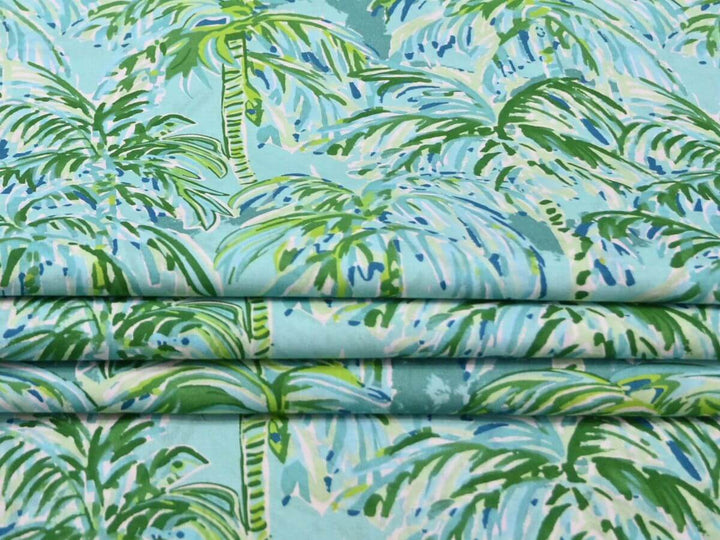 Tropical leaf patterned fabric with green leaves fabrics by the yard