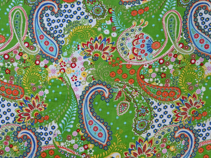 Traditional bandana paisley textile close up with green color fabrics store online from india
