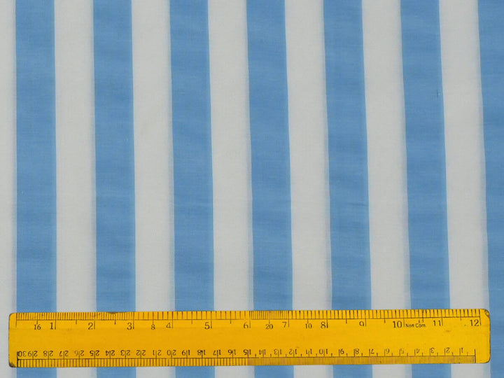Blue Stripe Fabrics & Textile featuring soft yarn dyed fabric with blue and white stripes, perfect for sewing projects.