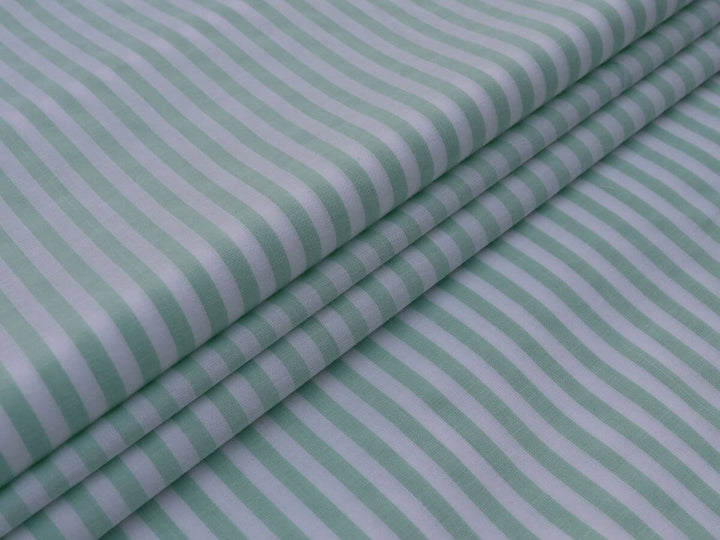 Online Fabrics by Yard Store - Indian Cotton Stripe Fabric in green and white, perfect for sewing and crafting.