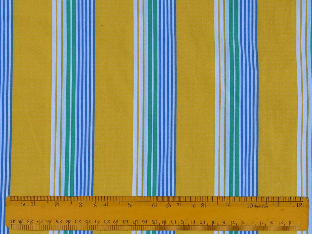 Stripe By the Yard Fabric featuring vibrant yellow and blue stripes with a ruler for scale.