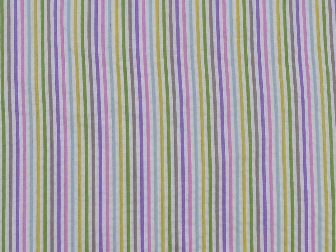 Woven stripe cotton fabric by the yard in vibrant colors, ideal for sewing projects and crafts.