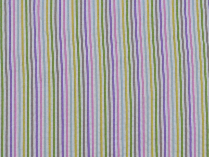 Woven stripe cotton fabric by the yard in vibrant colors, ideal for sewing projects and crafts.