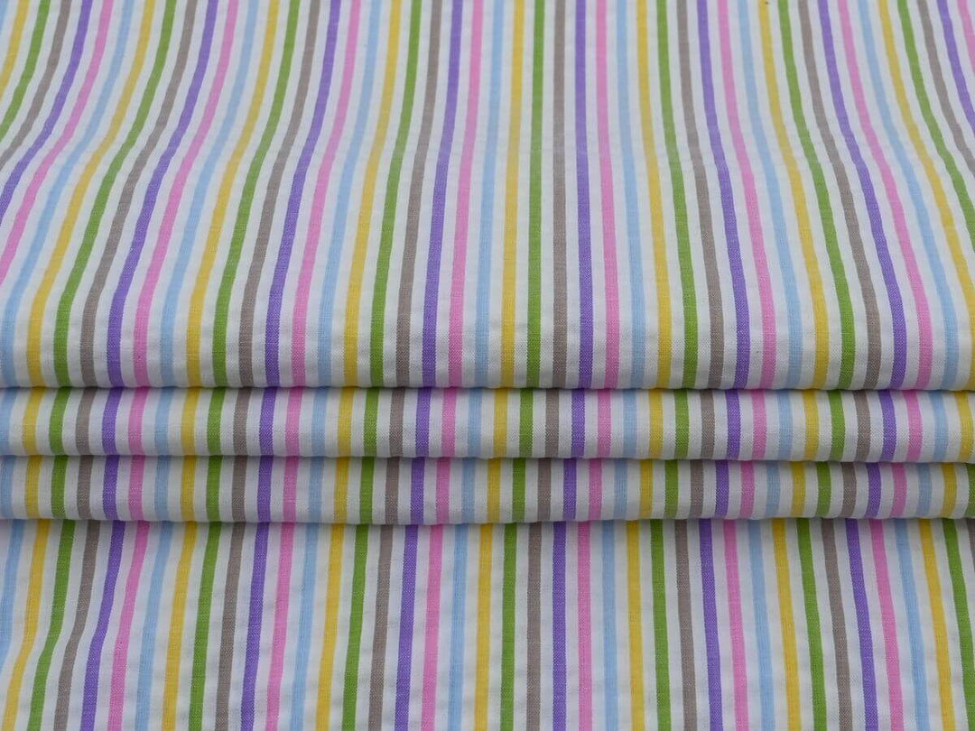 woven stripe cotton fabric by the yard in vibrant colors and patterns, ideal for sewing and crafting projects.