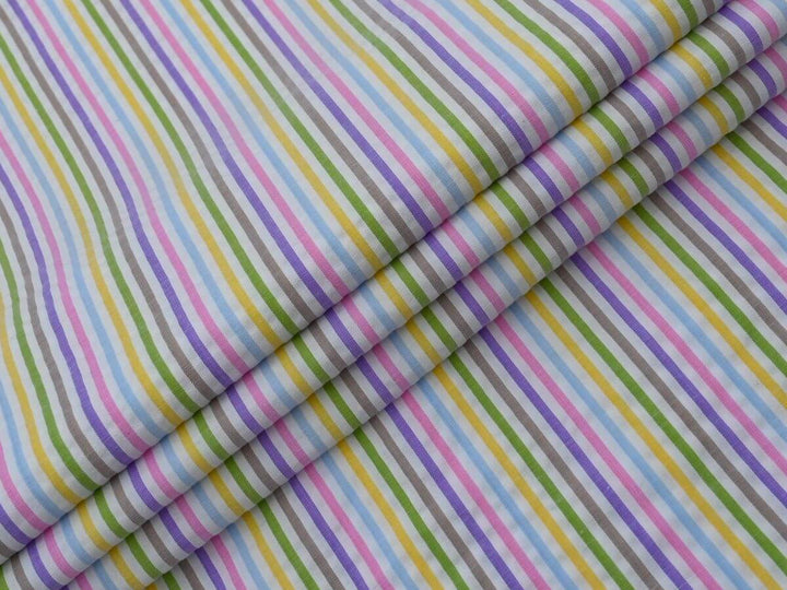 Woven stripe cotton fabric by the yard featuring colorful stripes, ideal for sewing projects and crafts.