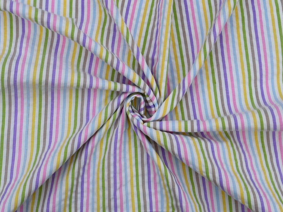 Woven stripe cotton fabric by the yard in vibrant colors, perfect for sewing projects and crafts.