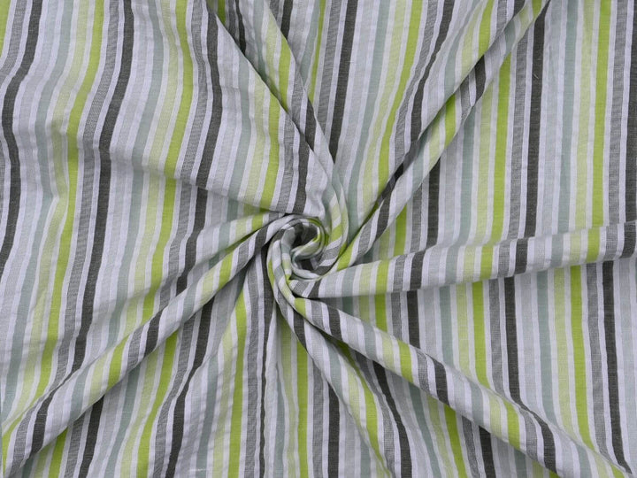 stripe seersucker fabric for women showcasing a colorful striped pattern in green, gray, and white, ideal for warm-weather clothing.