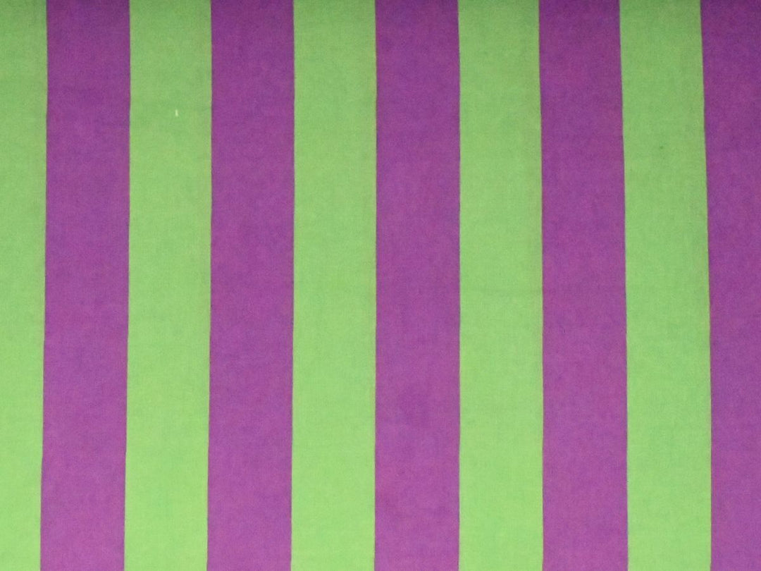 Indolibas purple and green striped cotton fabric shown against light to demonstrate its lightweight construction.
