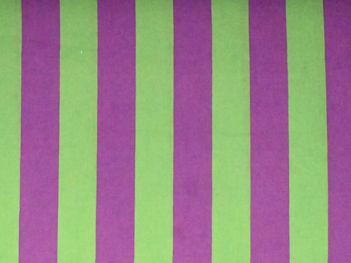 Indolibas purple and green striped cotton fabric shown against light to demonstrate its lightweight construction.