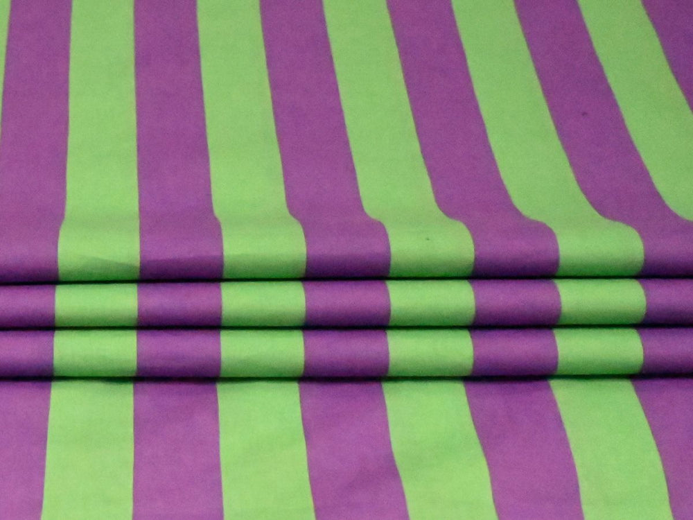 Close-up detail of the printed purple and green stripe pattern on 80 GSM lightweight cotton fabric.