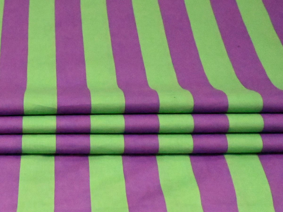 Close-up detail of the printed purple and green stripe pattern on 80 GSM lightweight cotton fabric.