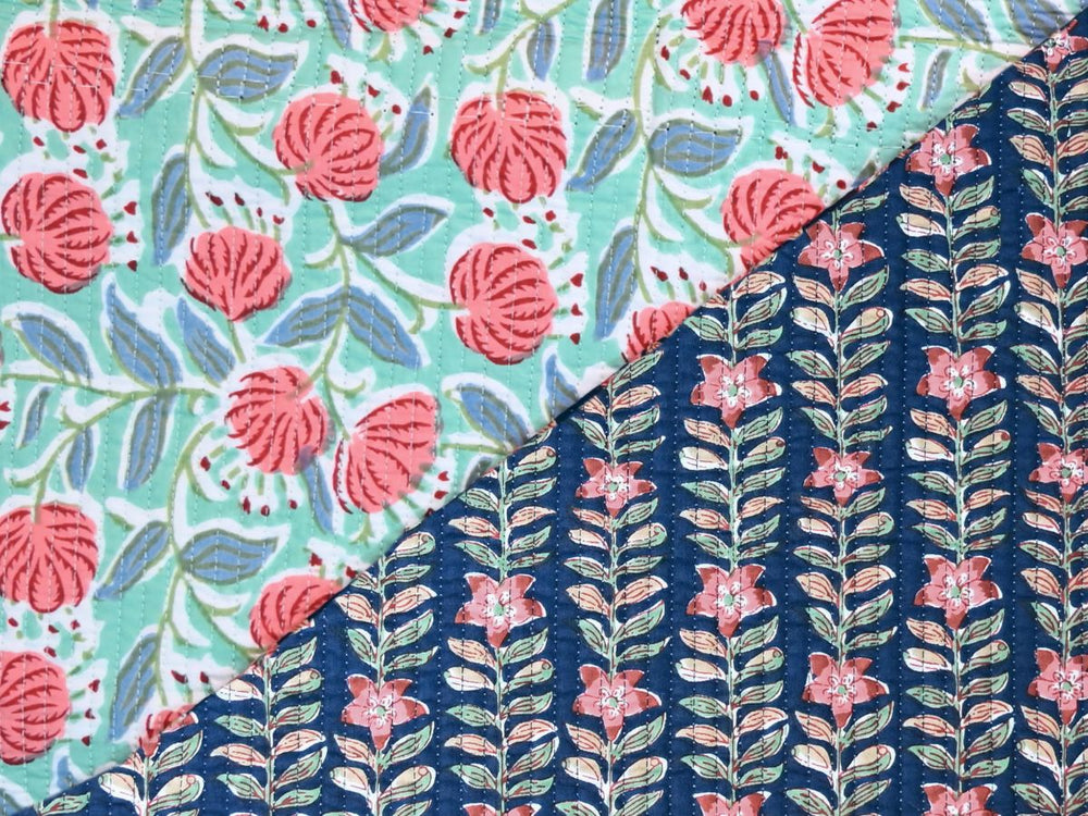 Aqua green floral quilted cotton fabric with coral pink flowers