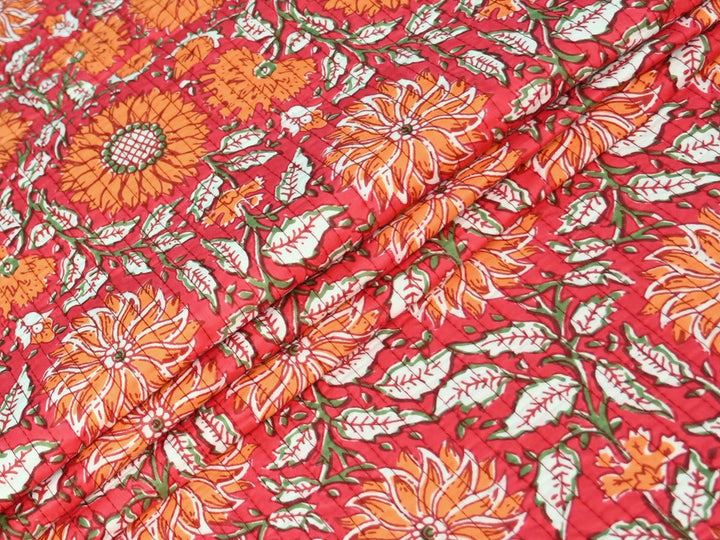 Indolibas woodblock quilting fabric with red floral botanical print