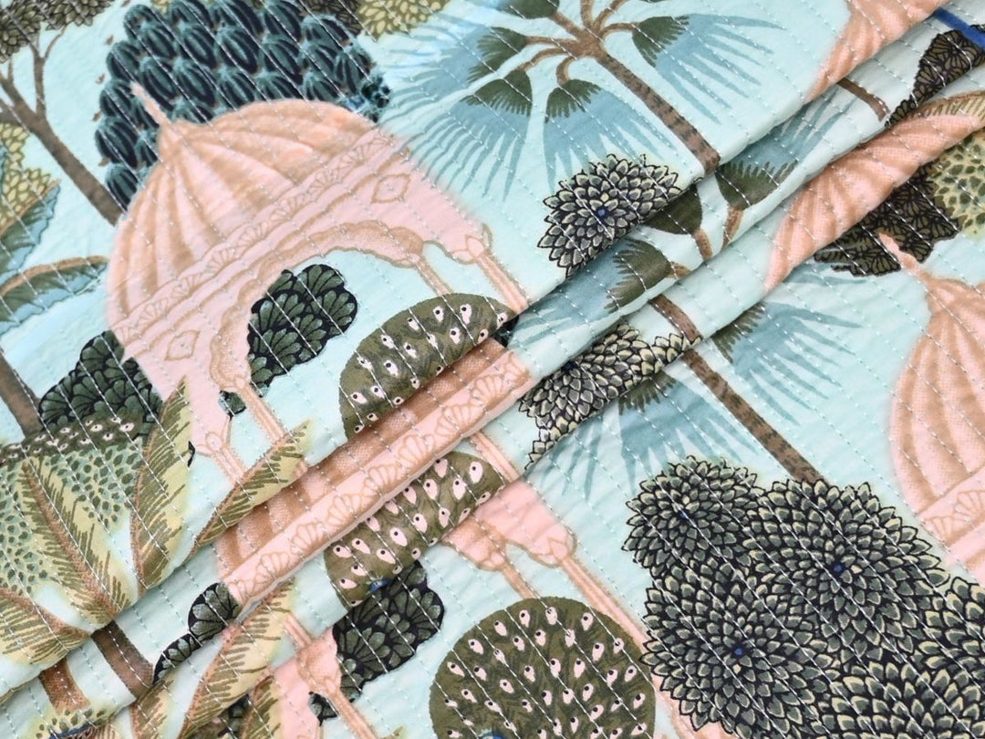 Indolibas tropical print quilted upholstery fabric with mint green background