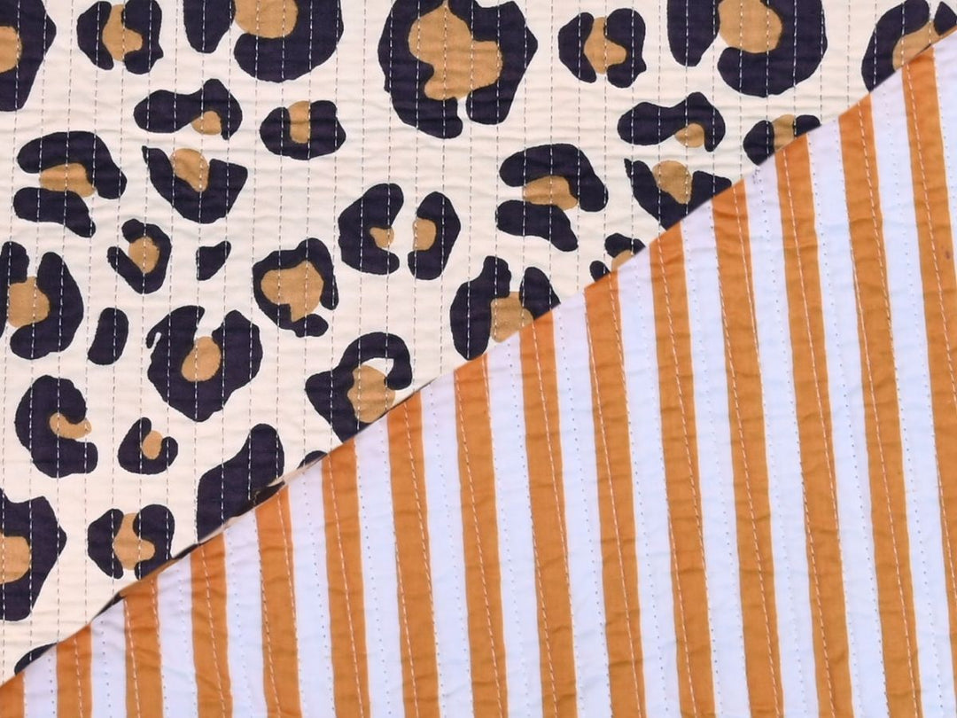 Medium weight quilted cotton fabric for cushions and light upholstery