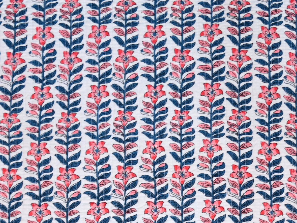 Quilted upholstery fabric by the yard with coral and navy floral stripe