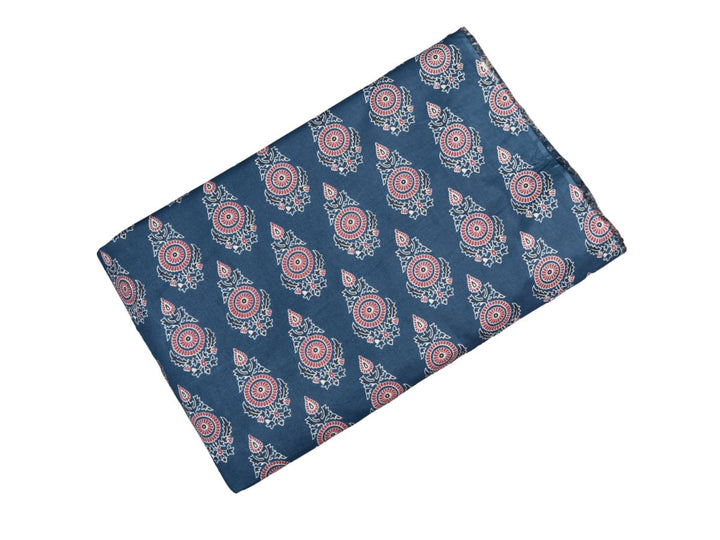 Navy block print fabric showing dusty rose and white fan-shaped flowers