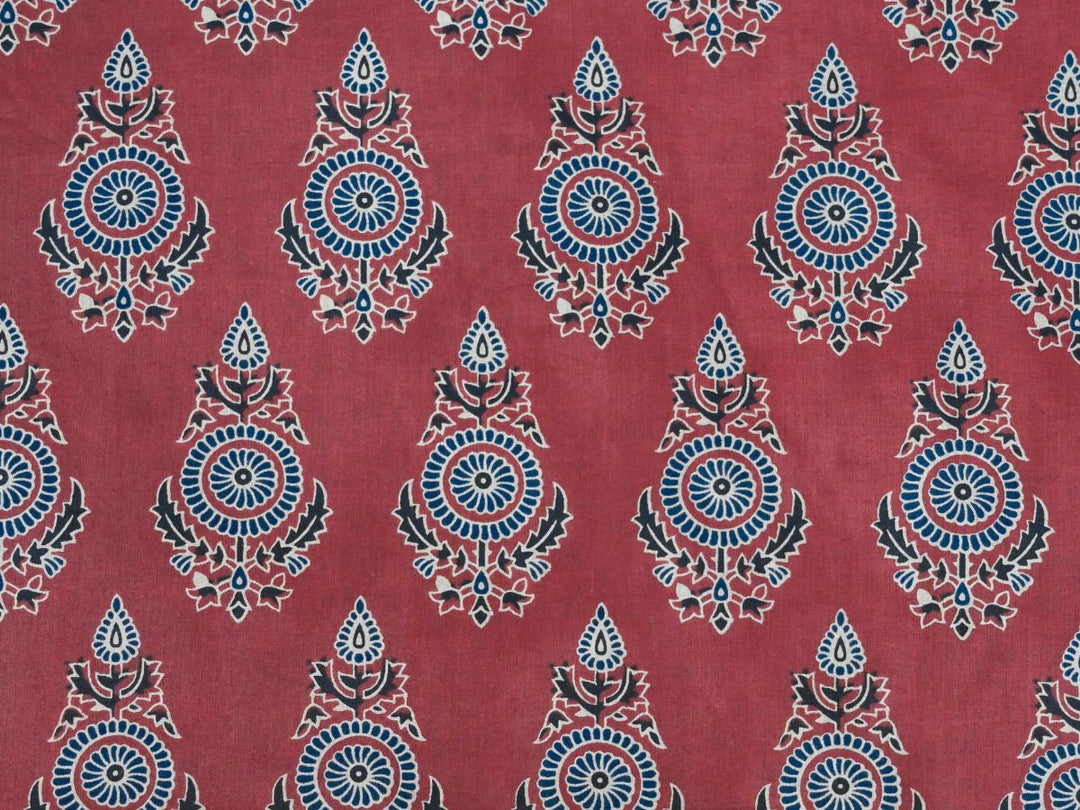 Indian block print cotton fabric with repeating floral sprig pattern