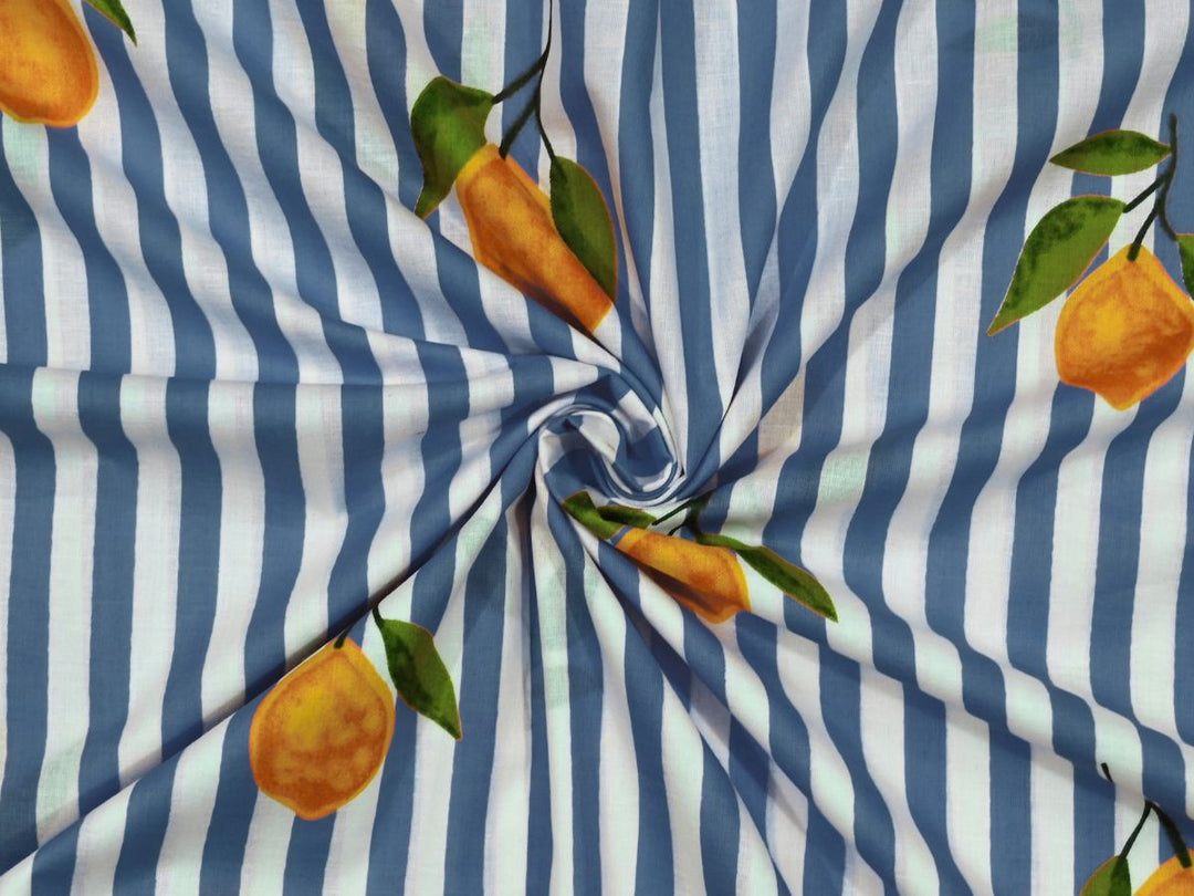 Blue lemon stripe fabric with yellow lemons and green leaves