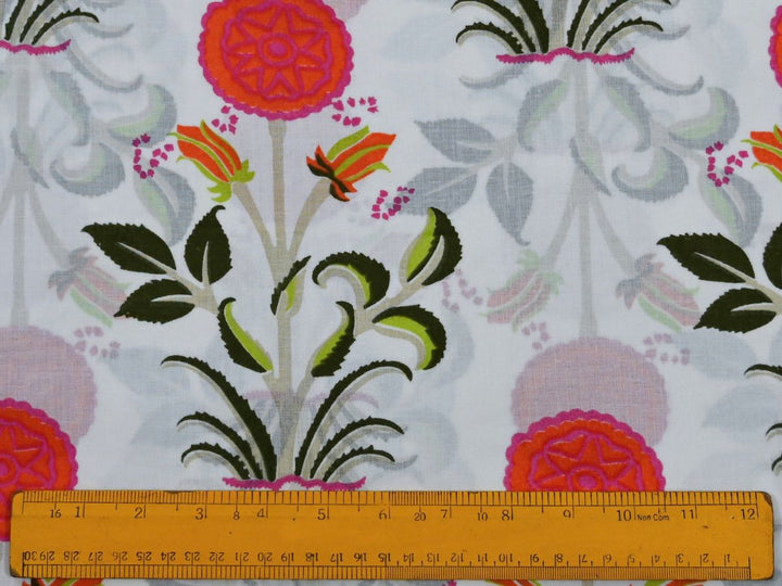 Indian print fabric folded showing green botanical and grey leaf details