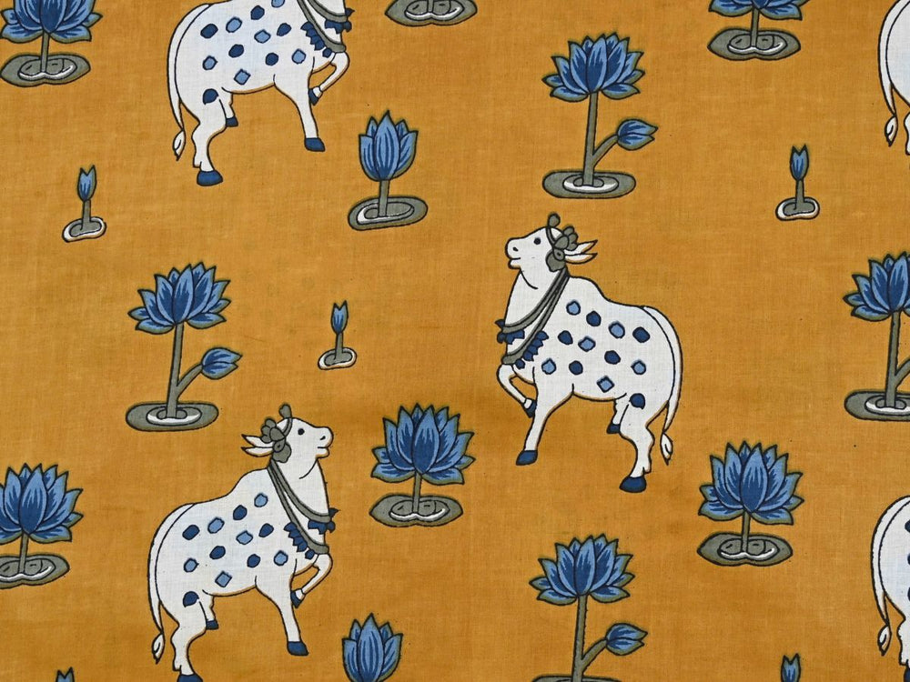 Cotton fabric by yard with mustard Pichwai cow and lotus print