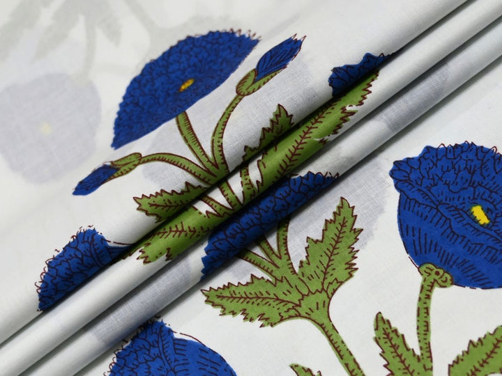 Blue poppy block print fabric by the meter with white background
