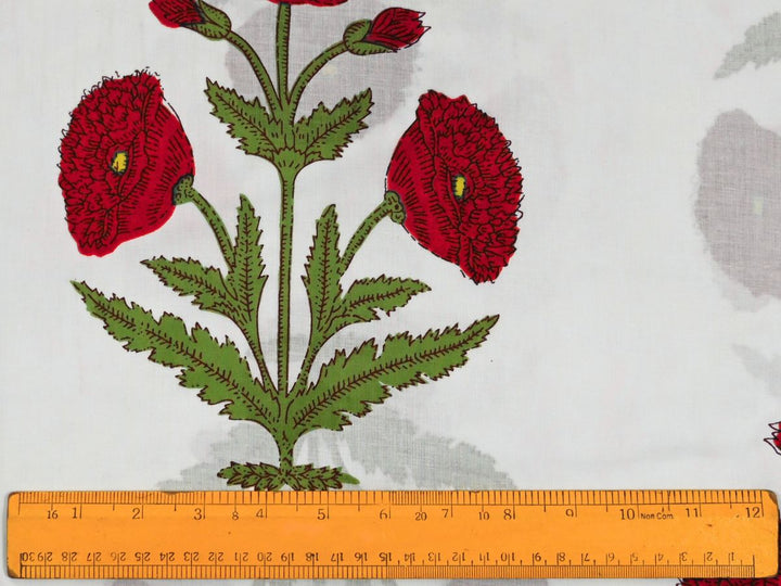 Mughal-inspired red poppy block print fabric with green leaves