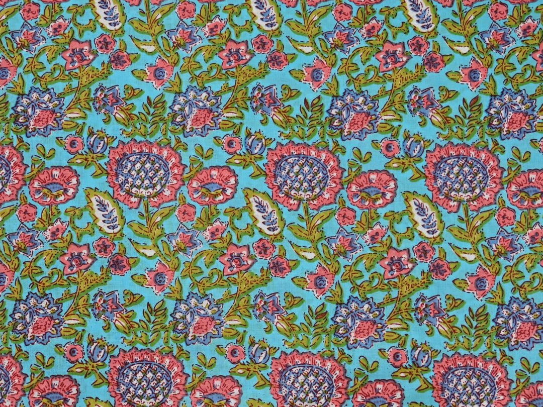 Affordable block print fabric by the yard with sky blue ground and pink florals