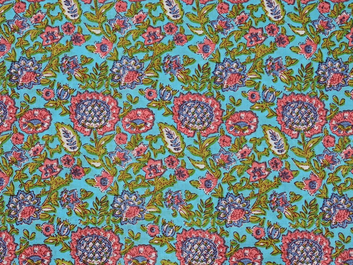 Affordable block print fabric by the yard with sky blue ground and pink florals