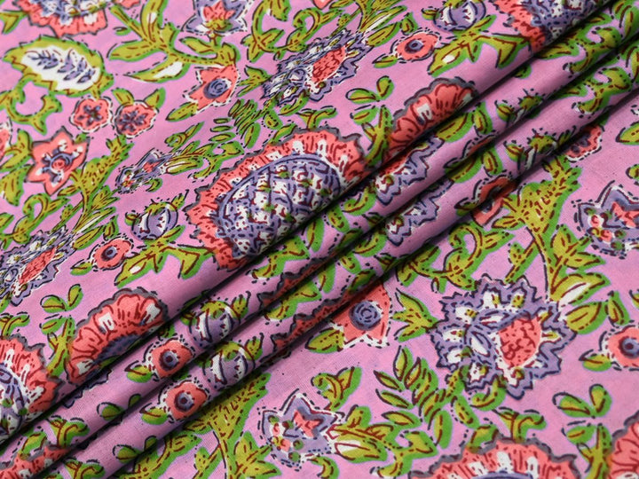 Affordable block print pink floral fabric by the yard with  pink ground and green florals