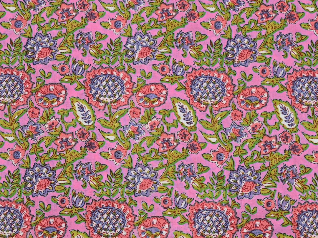Green floral Indian block print cotton fabric with blue and purple foliage