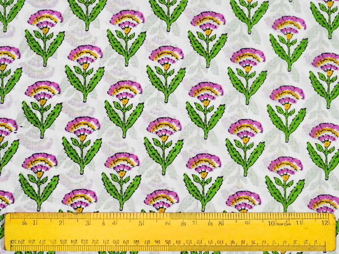 Small floral repeat block print fabric with green leafy stems