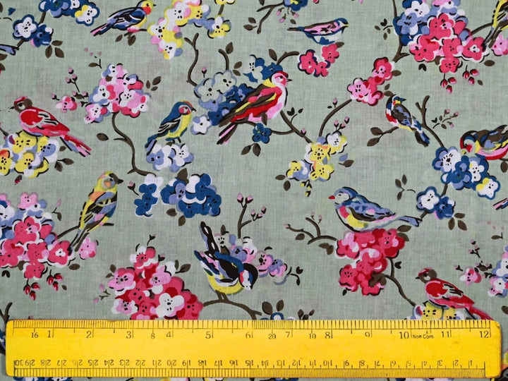Printed cotton fabric with folk-art bird and blossom pattern