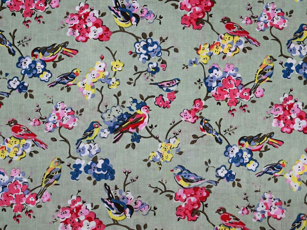 Cotton textile fabric by the yard with sage green bird and blossom print