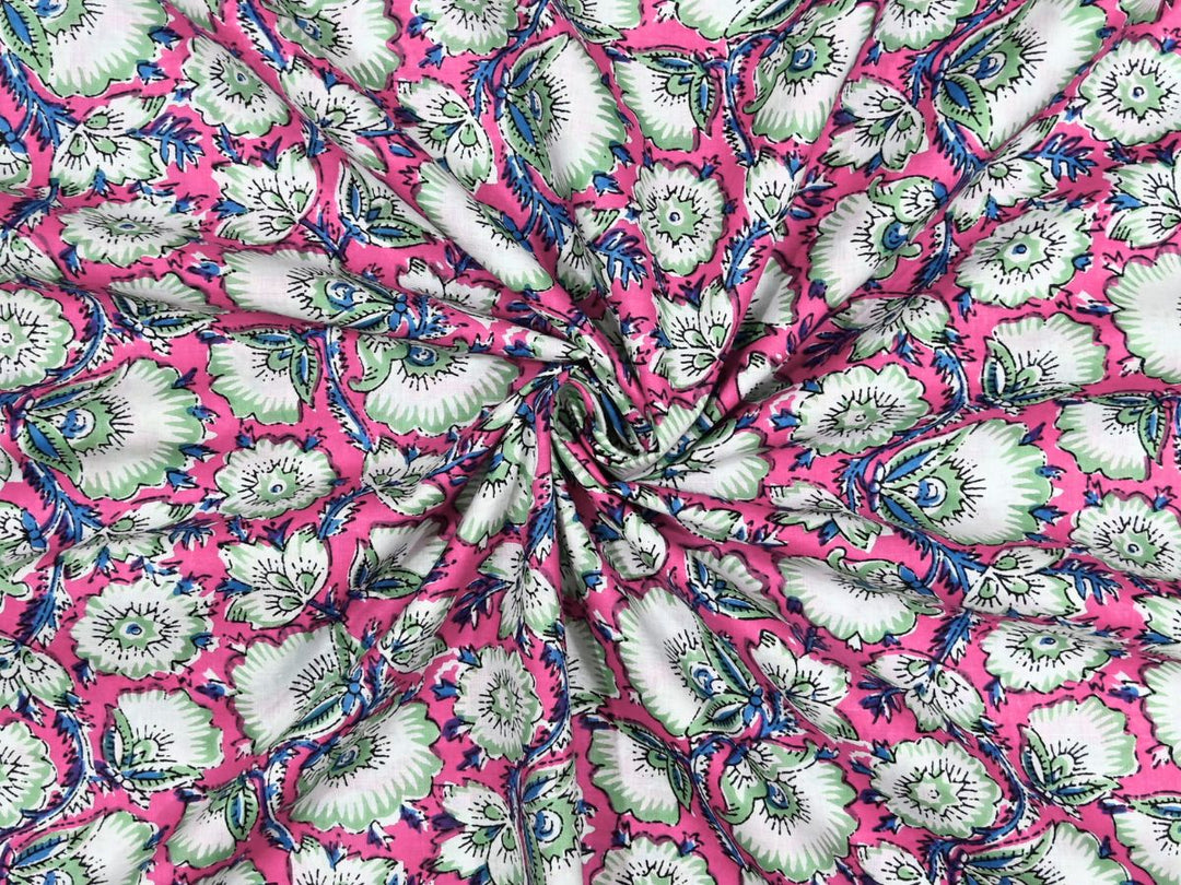 Pink floral block print cotton fabric with white and mint green flowers