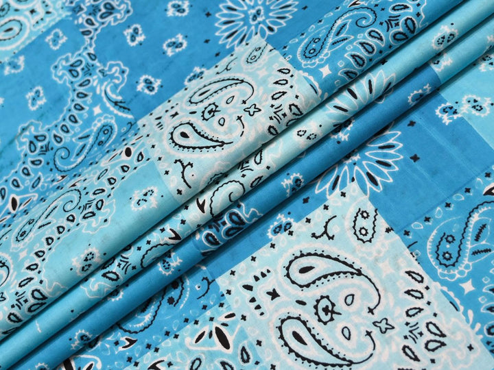 Blue bandana print fabric by the yard with patchwork cotton design