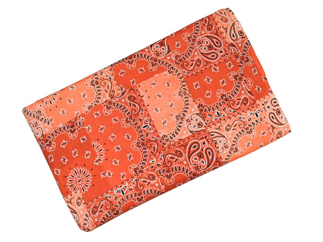 Western bandana print cotton fabric in light orange and coral squares