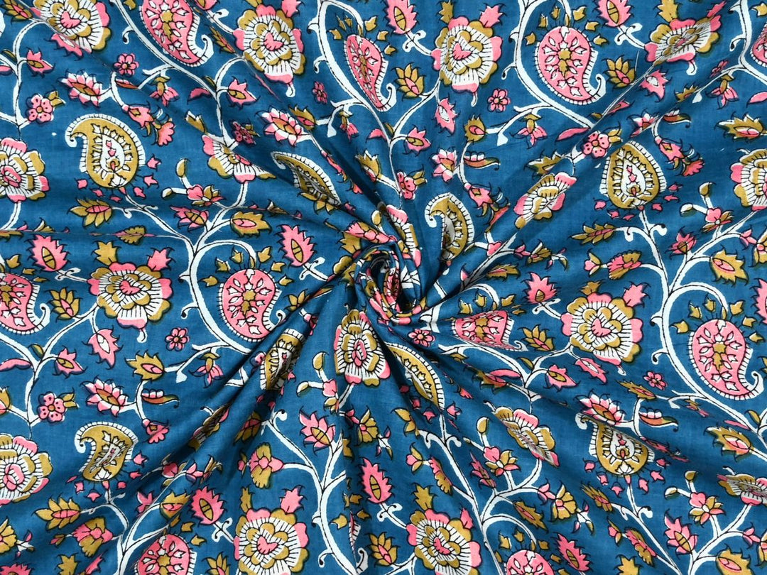 Deep blue paisley block print cotton fabric with pink and mustard motifs